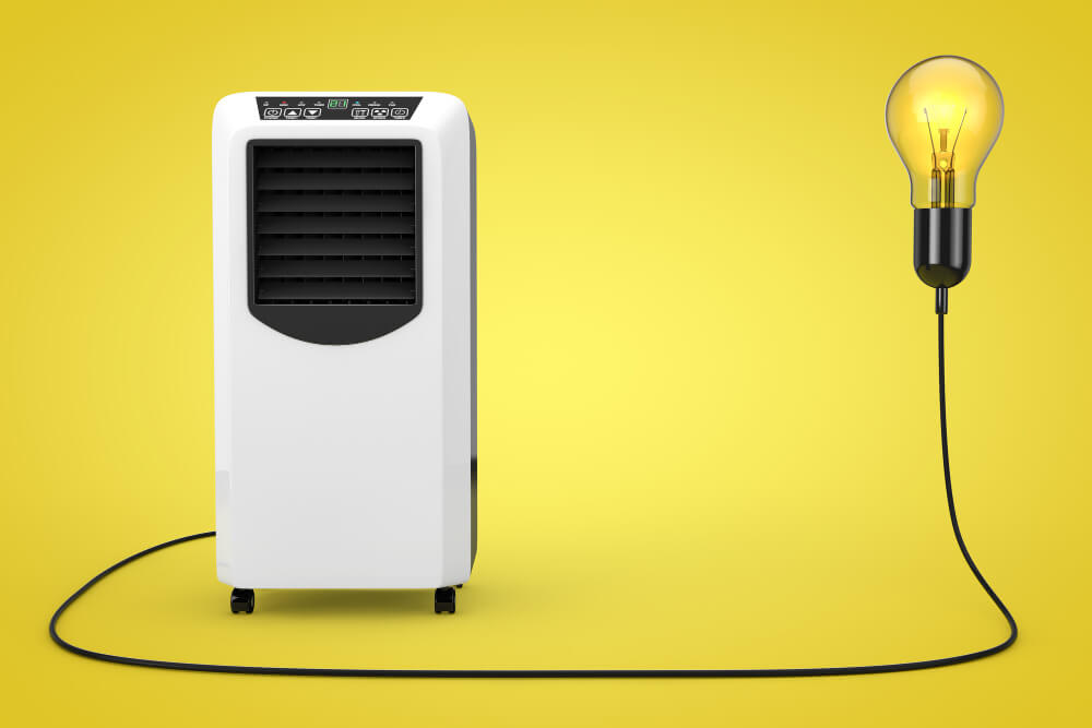 room cooling solutions article | portable-mobile-room-air-conditioner-connected-creative-idea-light-bulb-yellow-background-3d-rendering (1)